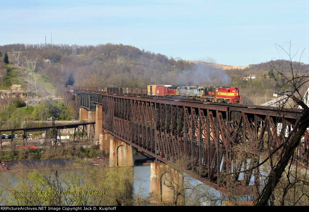 W&LE, Wheeling and Lake Erie GP35 2662 leads 100, AVR 3003,3001, 3004 westbound on the ex-P&WV bridge over the Monongahela River at, Speers Pennsylvania. March 27, 2012. 